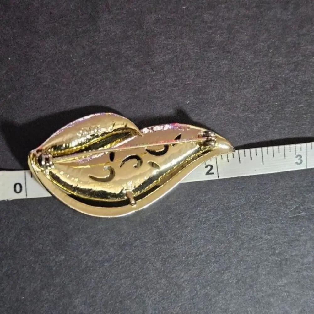 AJC vintage gold tone brooch